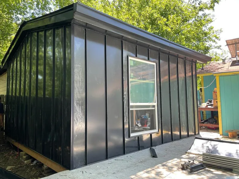 Black standing seam metal wall panels for Roof Inspection in Goddard