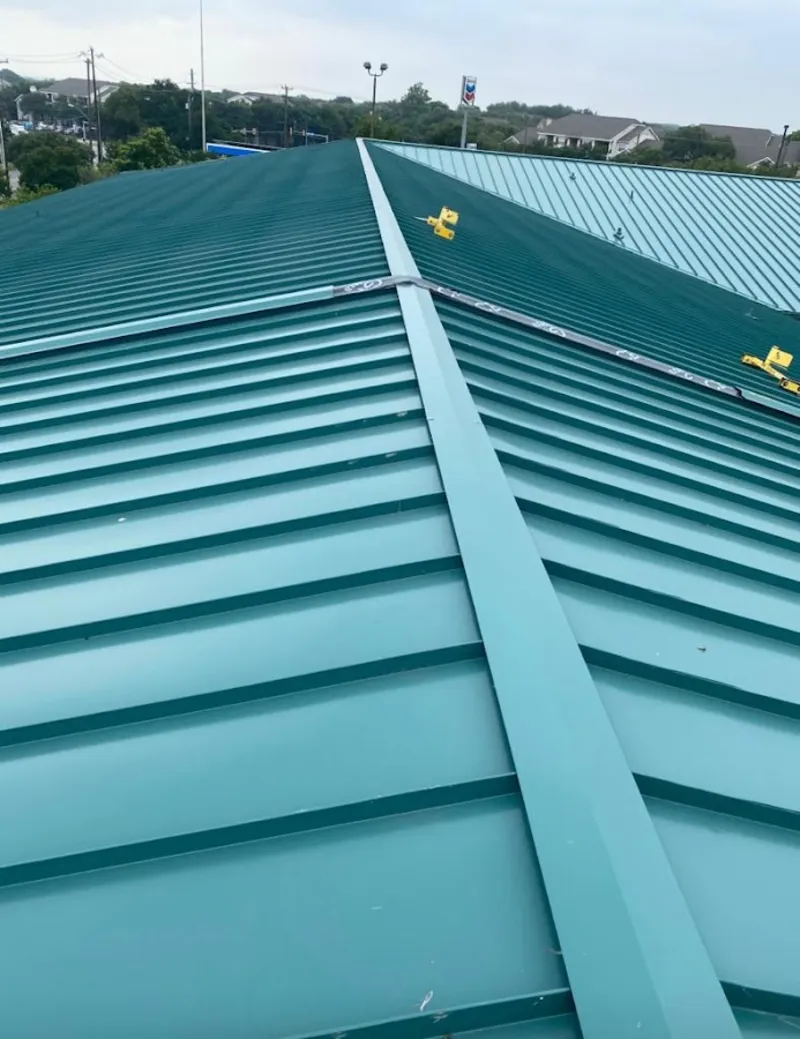 Green commercial metal roof ridge and valley for Metal Roof Repair in Goddard